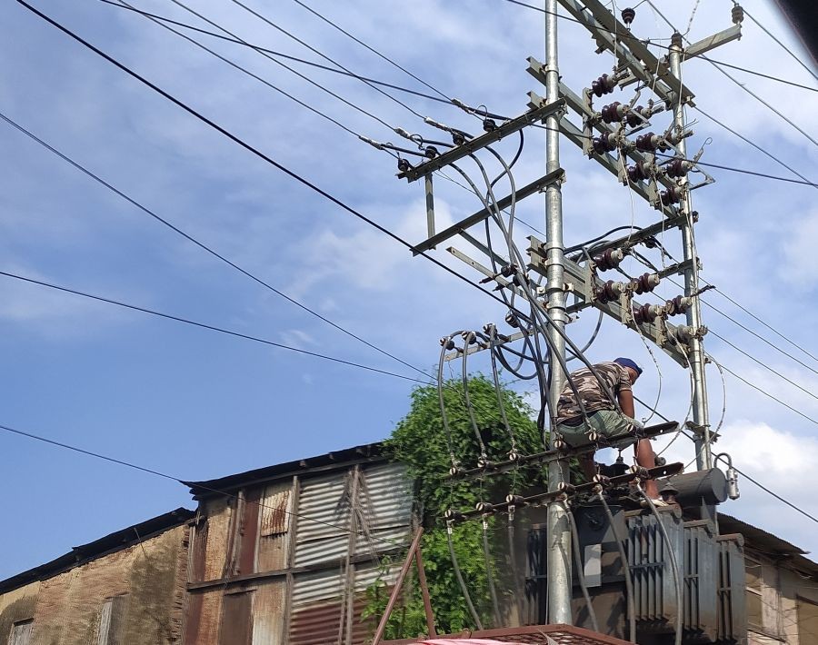 A worker looks on while repairing power lines at Church Road, Dimapur on November 4, 2020. (Morung file Photo)